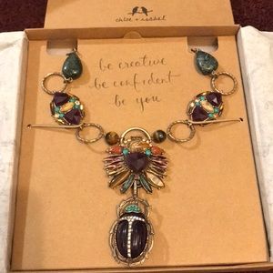 Chloe Isabel wild earth beetle statement necklace.